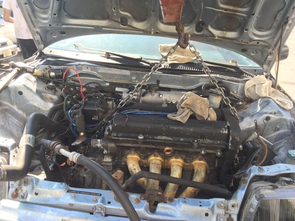 I was so excited that the only pics I took were of the motor going in lol. Mostly stock with about 120k. It does have a S2 throttle body and DC headers though so that’s a plus. Also it’s mated to the stock 5 speed and clutch. They will be coming out in due time for upgrading. Half way in!