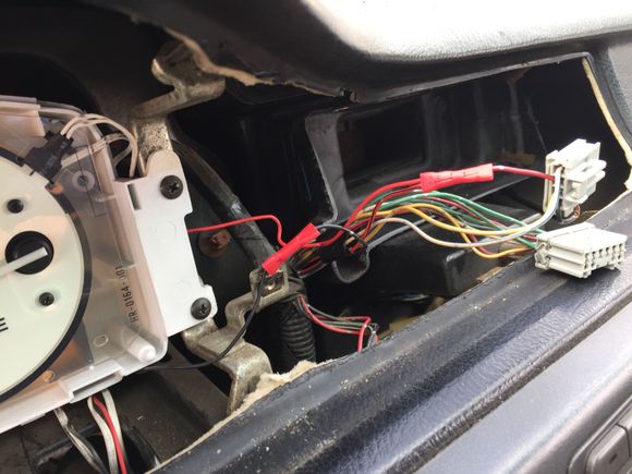 Spliced into these harnesses. Not sure what they're for but I know there's power on them. Splice positive to positive on one harness and negative to negative on there other harness. It was working before I bolted in place in. Now I can't figure out how to get them on again.