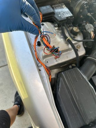 cut up harness on the car, any idea why its orange?