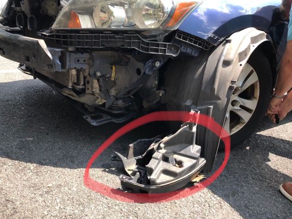 This mystery part was attached to the inner fender liner. 