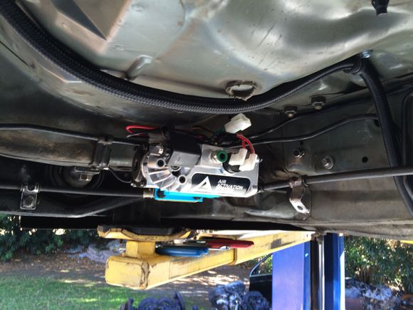 Locker mounted driver's side front of fuel tank area.