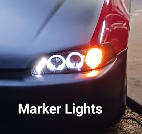 There are 3 small LEDs diagonally, the 2 Halo rings and an amber marker when the parking lights are on.