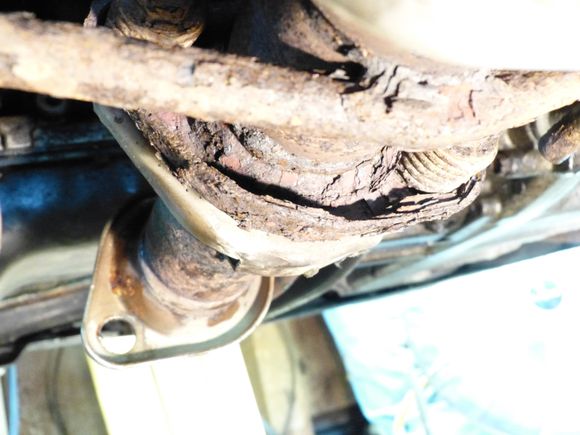 The not so old flange on the Bosal catalytic convertor disintegrating.
