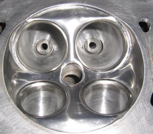 Ported/polish combustion chamber