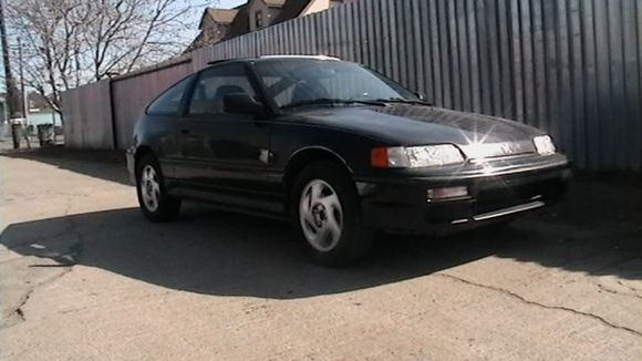 crx when first bought, well after a car wash.
Original wheels, pinstripes, and motor 142 k. complete interior.
Came from Canada.