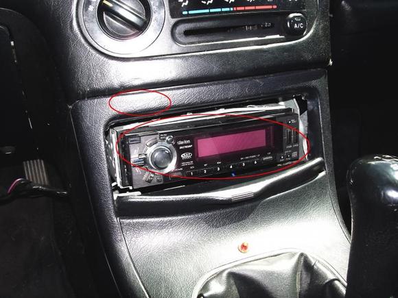 This project was fun! <sarcasm> I yanked out the stock stereo which was stuffed up clear in deep with wires wrapped all over. Then found out that the stereo that was used was CUT out harness and all, so I had to rewire EVERYTHING! <-To do this I cut the stereo harness out of my previous totaled civic, found wiring diagrams for both cars and rewired everything correctly with solid connections(no cheap shit). After which I installed the old aftermarket Clarion stereo from last car.