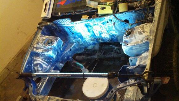 engine bay sanded down preppin for paint