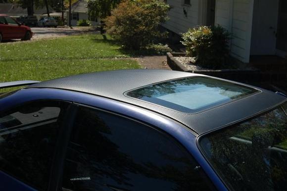 3M Dinoc carbon fiber vinyl roof wrap.