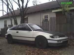 da 1990 CRX HF, SI engine, headers test pipe exhaust, ram intake, LS rims (flat black), LS seats, gutted rear, sleeve coilovers and tokico blues, and tints.