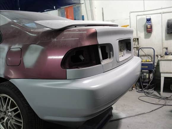 Rear bumper cover redone. O.S.! We're gonna have to deal with that run in the L/H corner...