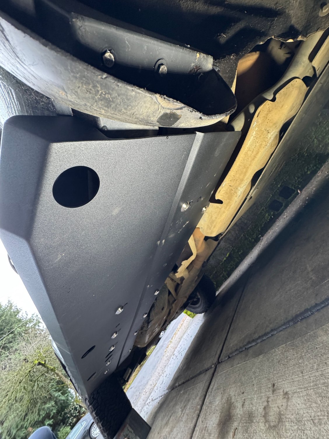 An underside view of the bolts snugged up. You can see a couple of the holes they have in here for the 