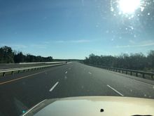 Long empty road to the north 2 1/2 hour drive to trail system in Ontario Canada 