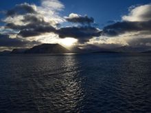 Early November 2015: Winter and final offload of the season. Big storm just passed and the harbor was full of other vessels so we had to anchor in a nearby lonely bay for the night.