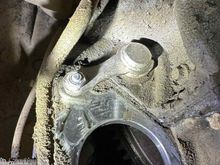 starter removed, fly wheel locking pin installed