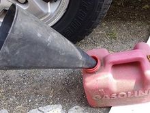 Use Funnel and Container to capture fuel leakage
