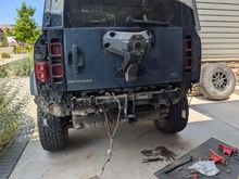 Bumper removed from the Defender. The square sensors by both tires are the rear radar for detecting cross traffic