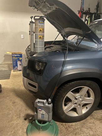 At 10000 miles it’s jet black 
Here pumping old oil into empties for disposal. 