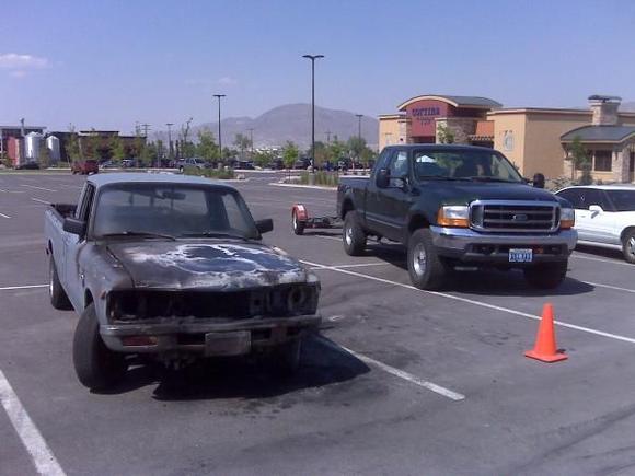 My 7.3L Power Stroke diesel about to tow my buddies truck after he did some creative stereo wiring !!