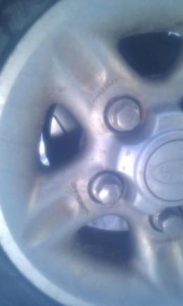 New slotted rotors. Rims are in great condition considering our New England Weather.