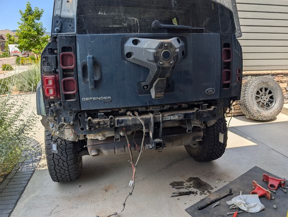 Bumper removed from the Defender. The square sensors by both tires are the rear radar for detecting cross traffic