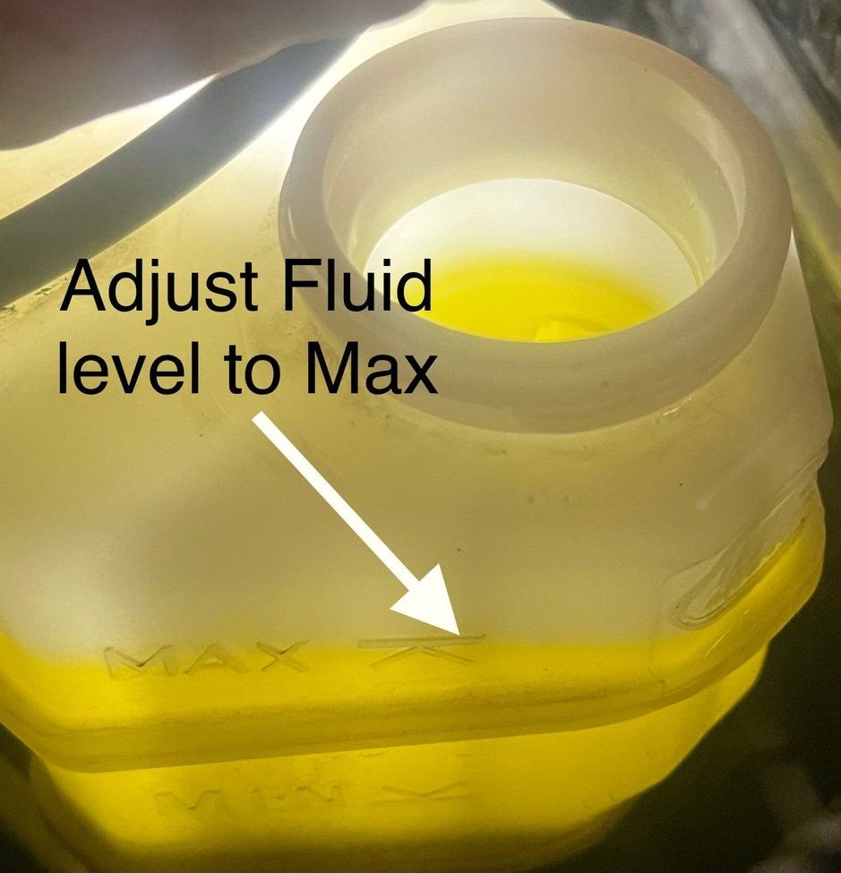 Top off/remove brake fluid in reservoir as needed after exiting service mode. 
