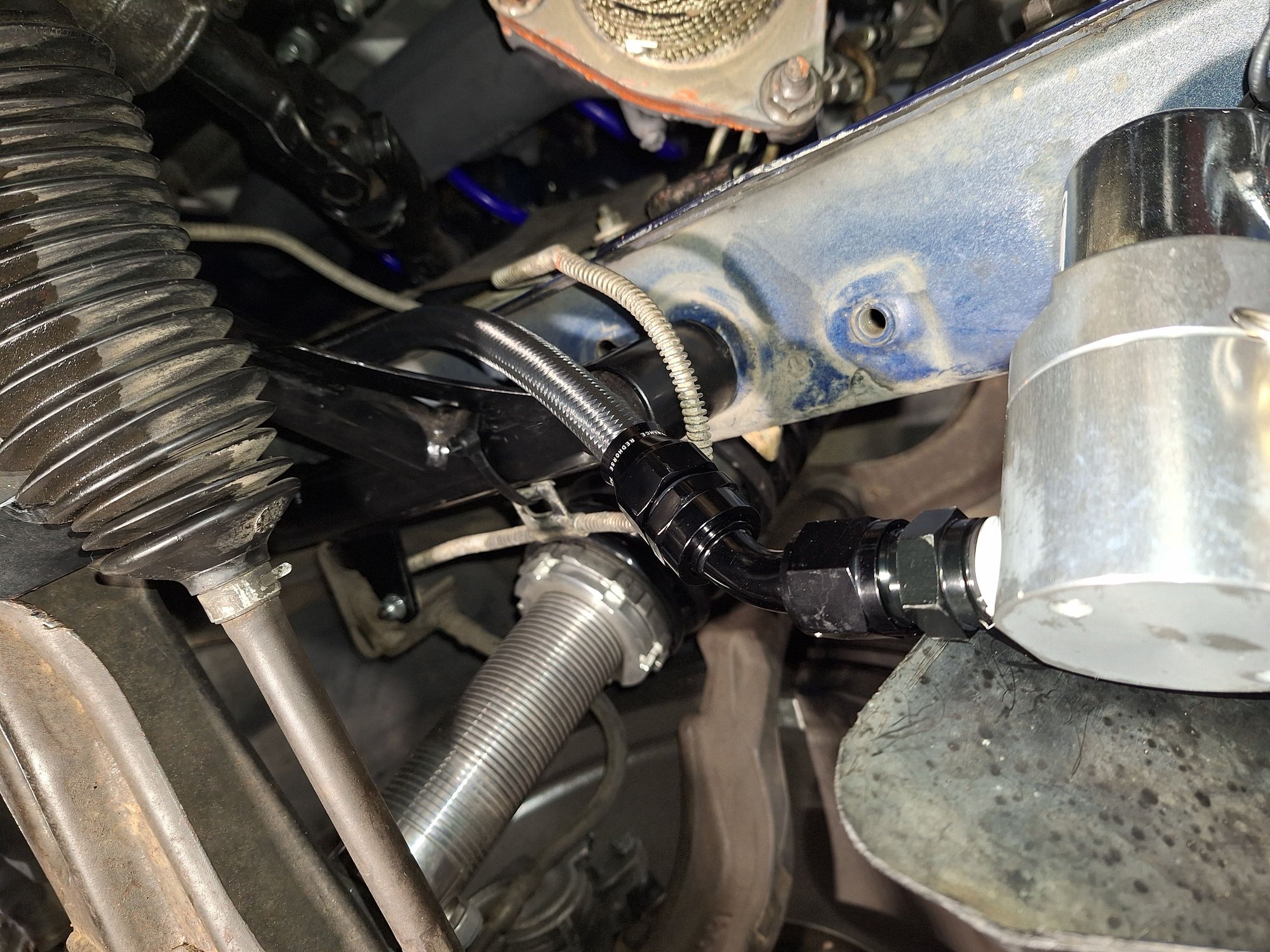PTFE line leaving the Accusump valve
