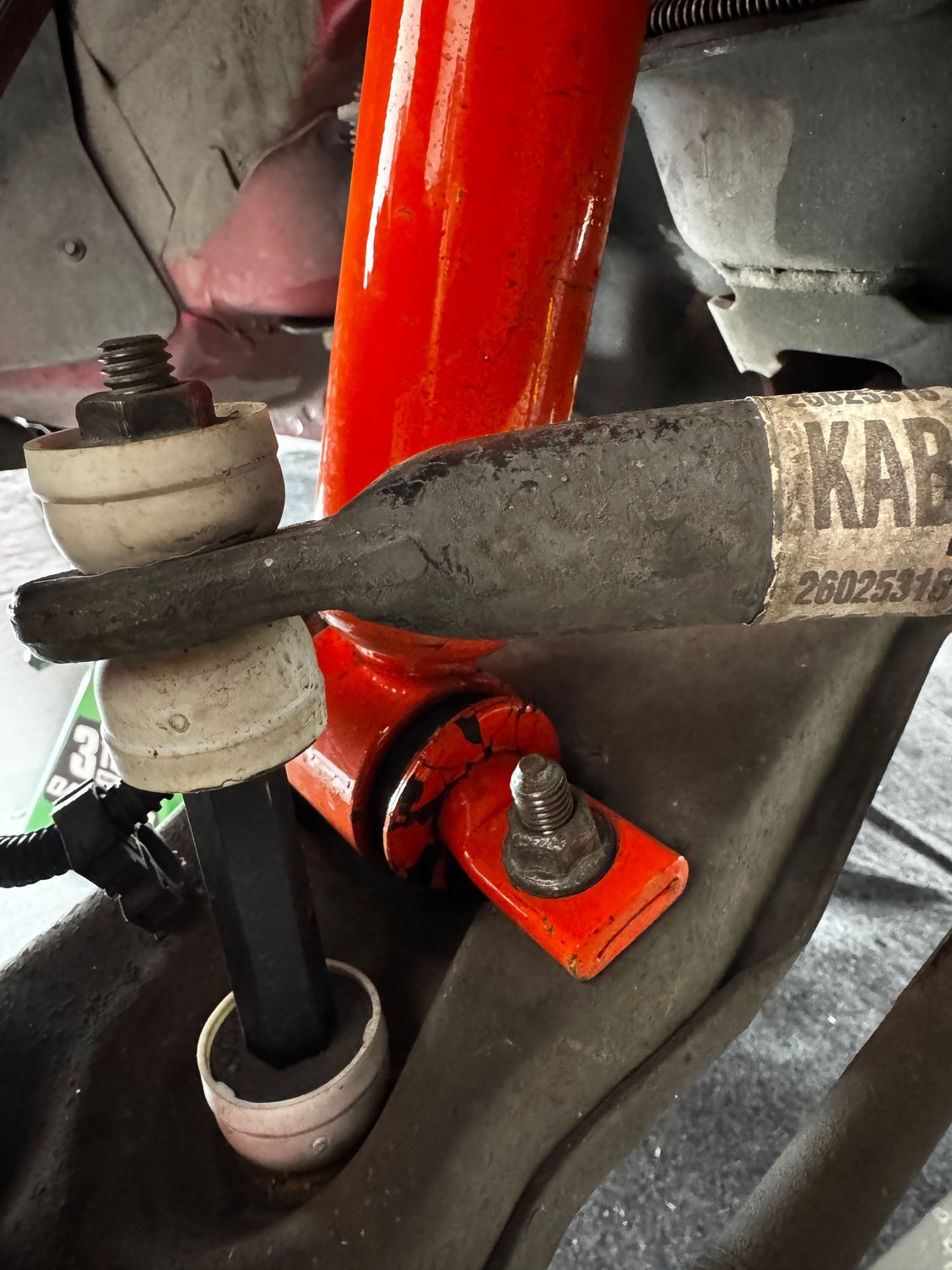 Front Passenger Side (front of shock mount)