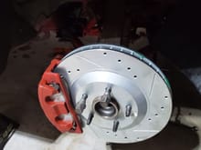 My current C5 rotor and brqket that moves the caliper out. no cutting or drilling 