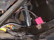 Looking up and behind the radio hvac housing where on camaros iy would be