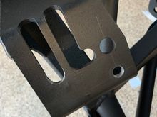 You can see my scribe marks for my measurements.  In addition to the lower hole in the lower right corner, I also had to elongate the front slot.