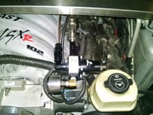 fuel pressure regulator mounted on schrader valve port of fuel rail