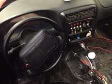 Line lock on the steering wheel and trans brake on shifter. Moroso switch panel with led