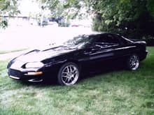 This one here is the 2nd car of the collection a 2002 black leather B4C from Oklahoma , 1 of 320 made so I pulled out the LS1 and added a high compression 6.6 L and CNC'd heads along with C-5 Vette rims and matching brakes, soon to have a wilson manafold 2 stage nitrous kicking 200 and 300 respectivly and already added a aluminum center sectioned,trussed and 35 splined 9 inch.