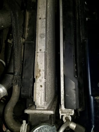 I have roughly 1.5" or more gap between the radiator and condenser.