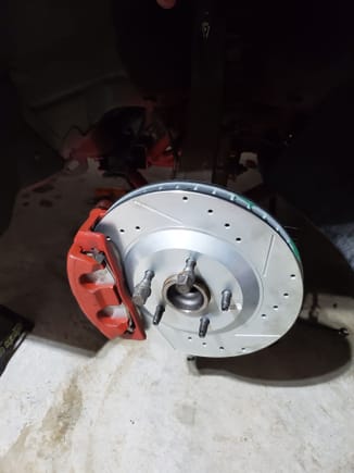 My current C5 rotor and brqket that moves the caliper out. no cutting or drilling 
