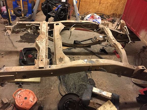 Got the bed off, most of the rear suspension ripped out, and fuel tank removed.