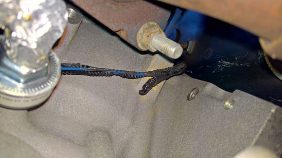 The cheap split loom around the knock sensor extension harness melted even though it was no where near touching the exhaust. The wire itself is fine though.