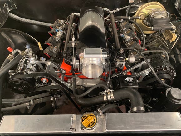 You can see the AC brackets. You don’t have to run AC if you don’t want too... they also offer a kit that has PS on driver side and ALT on pass side