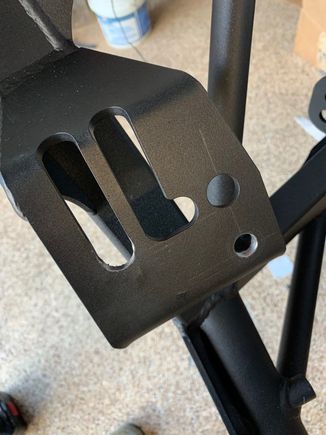 You can see my scribe marks for my measurements.  In addition to the lower hole in the lower right corner, I also had to elongate the front slot.