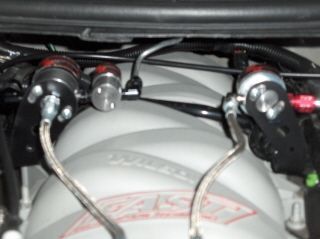 Closeup of the purge line and the solenoid brackets from Nitro Dave's.