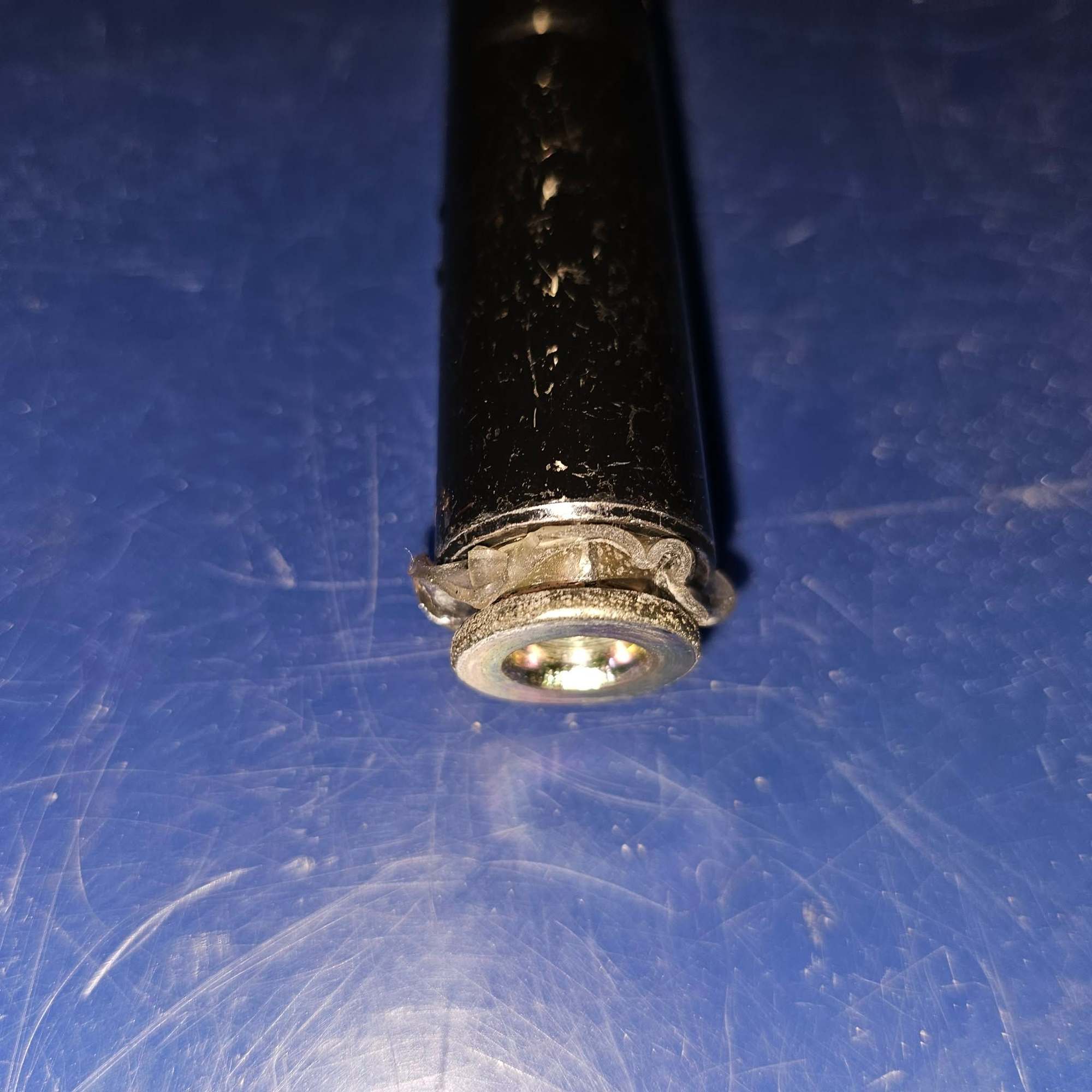 Gorilla double sided tape to keep 14mm nut from falling at the inside of trunk for top mounting of rear struts.