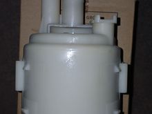 What do you think? It's the original oem nissan in-tank fuel filter. It just doesn't have the rubber notch from the new one I put in. It has 119k miles and did not have to be replaced. It's stored in the new oem packaging. I'm kind of meticulous about organization, lol. Thanks for any advice you can offer! God bless Slvr2K-- Steven
