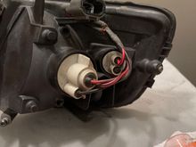 The stock side lamp harness you will have to pull from a yard if you don’t want to cut into your existing side lamp harness. The smaller bulb is the city light.