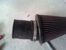 Insert the Tube to the filter and insert to the car and make sure there is enough clearance if not cut that pipe to make enough.