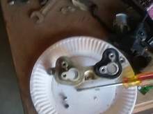 2 dowl pins and 3bolts. To hold it in place