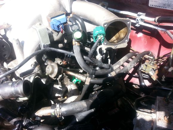 Check this hose, its a coolant line that connects under TB. near the back
