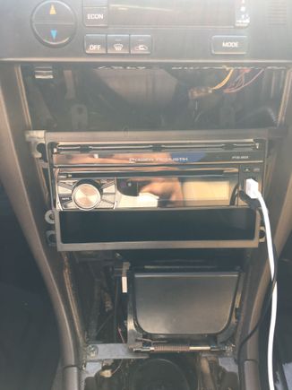 I already ordered a shift boot but I don't know what the panel is called around the shifter, it has the little hole on the top left for the cigarette lighter