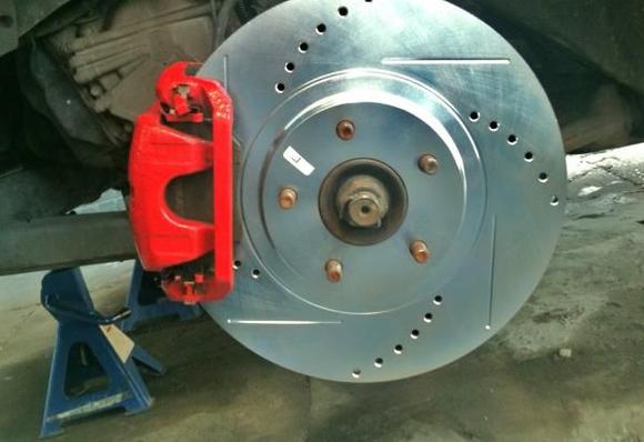 Drilled and slotted Rotors... These make a hell of a difference with stops