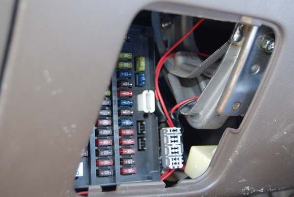 Wiring going from the mirror to the power and dimmer switch. Doesnt look so stock :/