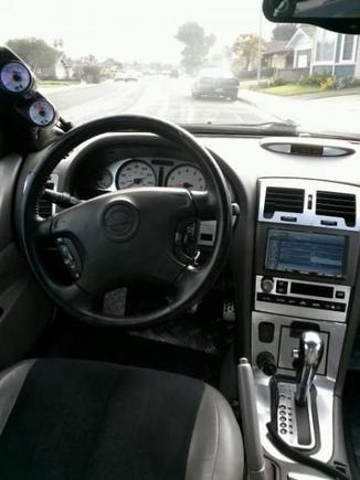 Eclipse AVN 5510 dual-din touch screen dvd/mp3/cd/built-in navigation receiver 
(wired so dvd's can be watched WHILE driving) 

Custom molded gauge pod 
Glow-Shift A/F gauge 
Glow-Shift volt gauge 
Sport Pedals 
Custom painted trim pieces, dash pieces, and pillars.